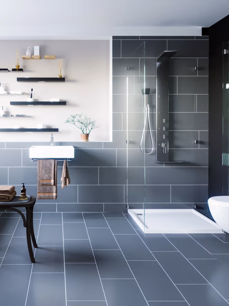 Modernes Badezimmer mit Badewanne, Dusche und blau-grauen Wandfliesen.